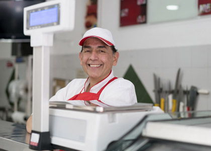 man in front of grocery scale